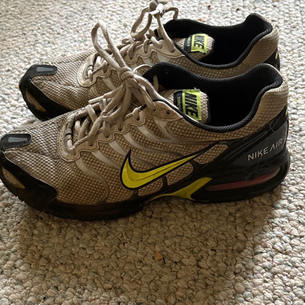 Nike Air Sneakers with Yellow and Black Accents